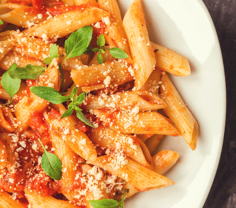 penne-pasta-tomato-sauce-with-basil-parmesan-cheese-rustic-wooden-background